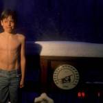 A 9-year-old Carl Tape — now a seismologist at UAF’s Geophysical Institute — poses beside a thermometer registering 50 below zero Fahrenheit during a Fairbanks cold snap in January 1989. (Courtesy Photo / Walt Tape)