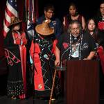 Joel Jackson speaks for members of Kake during memorial service for the Guardian Flight crew held at Juneau-Douglas High School: Yadaa.at Kalé on Friday, June 7, 2019. (Michael Penn / Juneau Empire File)