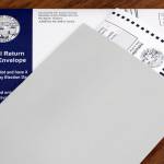 This photo shows a by-mail ballot sent to an Alaska voter in October. Monday marked the first day of early in-person voting for the 2020 general election. (Ben Hohenstatt / Juneau Empire)