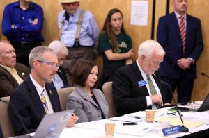 From left, University of Alaska Fairbanks Chancellor Daniel White, UA Anchorage Chancellor Cathy Sandeen and then-UA Southeast Chancellor Rick Caulfield speak at a UA Board of Regents meeting in Anchorage on July 30, 2019. Sandeen, the chancellor of the University of Alaska Anchorage has announced her intention to take a new position as the president of a California university, Thursday, Oct. 29, 2020.(AP Photo / Dan Joling)