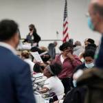 Election challengers observe as ballots are counted at the central counting board, Wednesday, Nov. 4, 2020, in Detroit. (AP Photo / Carlos Osorio)