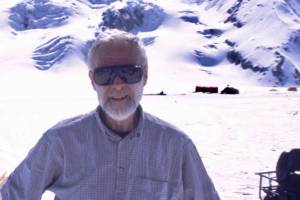 Glaciologist Will Harrison stands on Black Rapids Glacier. (Courtesy Photo / Martin Truffer)