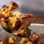 This August 2020 photo shows a recipe for traditional Thanksgiving stuffing in New York. The recipe can be cut in half and baked in a smaller pan for less time for a smaller group. (Katie Workman via AP)