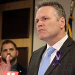 Gov. Mike Dunleavy speaks during a news conference in Anchorage in March. Dunleavy faces criticism for his handling of COVID-19, from those who think hes not doing enough to address rising case counts to those who think hes been overreaching. (AP Photo / Mark Thiessen)