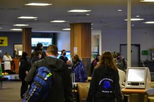 Travelers arrive at the Juneau International Airport on Wednesday, Nov. 25, 2020, made up only about half of what the airport normally sees in the days leading up to the Thanksgiving holiday. (Peter Segall / Juneau Empire)