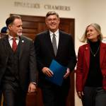 Alaska Supreme Court Chief Justice Joel H. Bolger, center, is escorted to the House of Representatives by Sen. Peter Micciche, R- Soldotna, left, and Rep. Andi Story, D-Juneau, for the annual State of the Judiciary speech at the Capitol on Wednesday, Feb. 20, 2019. (Michael Penn / Juneau Empire File)