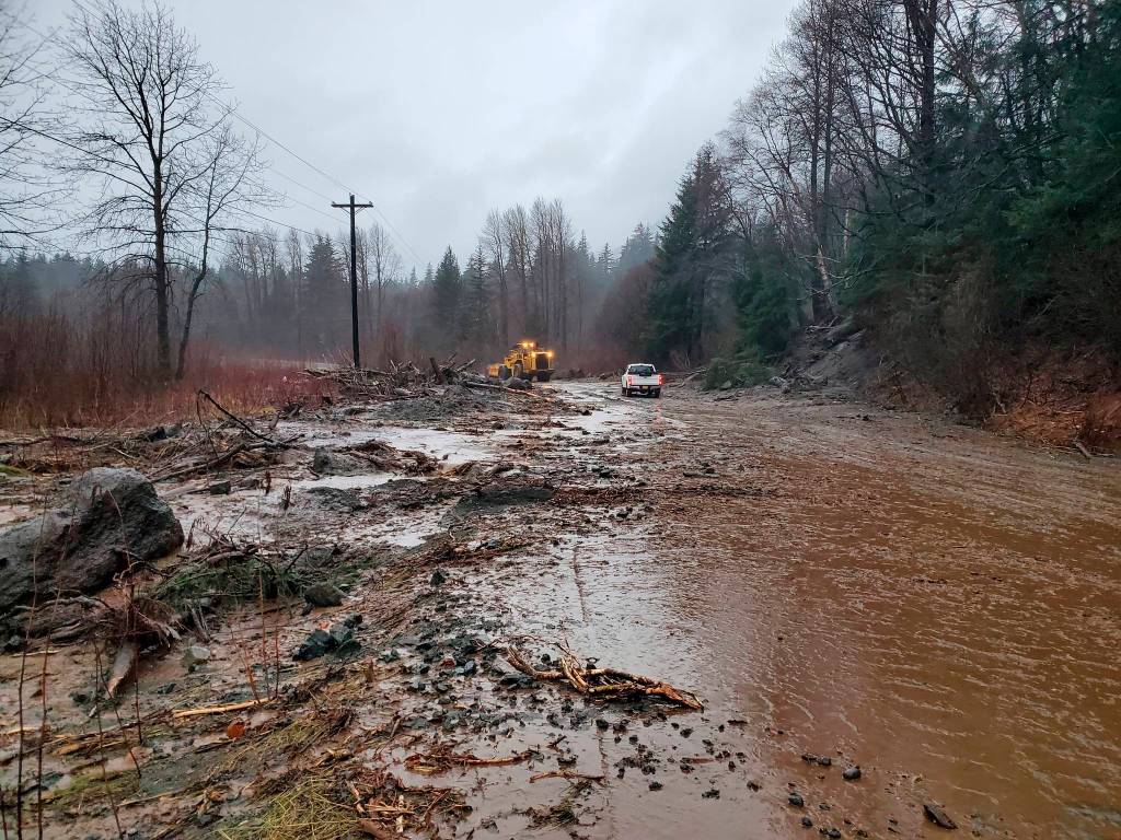 This photo provided by the Alaska Department of Transportation and Public Facilities shows damage from heavy rains and a mudslide 600 feet wide in Haines, Alaska, on Wednesday, Dec. 2, 2020. Authorities say six people are unaccounted for, and four homes were destroyed in the slide, with the search resuming Thursday morning for survivors. (Matt Boron / Alaska Department of Transportation and Public Facilities)