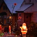 Peter Segall / Juneau Empire
Santa stands among festive lights near B Street and West 11th Street near Northern Light United Church.