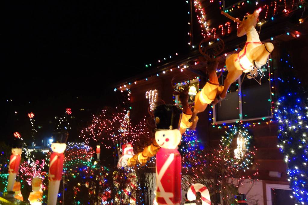 Reindeer dash away the evening of Dec. 23 at the house crowned the Best of Juneau in a revamped Lights Up Juneau 2020 contest. (Dana Zigmund / Juneau Empire)