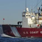 U.S. Coast Guard Cutter Polar Star (WAGB-10) transits the waters of Puget Sound near Seattle on Dec. 4, 2020. The crew is deploying on rare wintertime mission to the Arctic Circle. (U.S. Coast Guard / Petty Officer Steve Strohmaier)