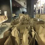 The Juneau School District prepares hundreds of meals each weekday to feed children in Juneau as seen here at Thunder Mountain High School on Dec. 21.