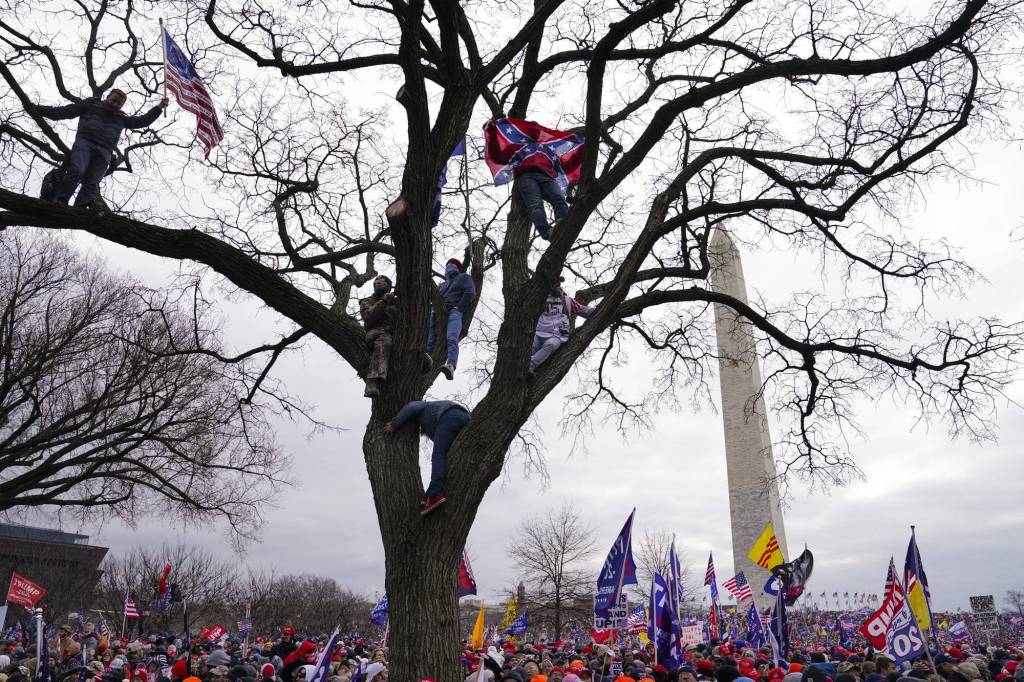 Trump supporters participate in a rally Wednesday, Jan. 6, 2021 in Washington. As Congress prepares to affirm President-elect Joe Bidens victory, thousands of people have gathered to show their support for President Donald Trump and his baseless claims of election fraud. The president is expected to address a rally on the Ellipse, just south of the White House. (AP Photo/John Minchillo)