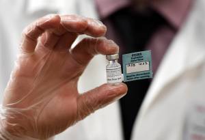 A vial of the Pfizer vaccine used at The Reservoir nursing facility, is shown, Friday, Dec. 18, 2020, in West Hartford, Conn. (AP Photo / Stephen Dunn,Pool)