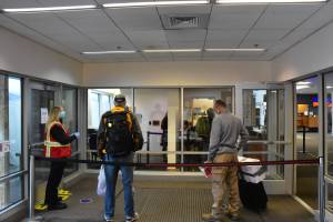 Even as coronavirus numbers are going down and vaccines are being distributed, pandemic-related facilities like the testing site at Juneau International Airport, seen here in this Oct. 12 file photo, are scheduled to remain for some time, according to city health officials. (Peter Segall / Juneau Empire file)