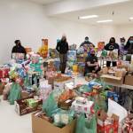 Members of the Black Awareness Association of Juneau and other volunteers collect donations from Juneau residents from their Martin Luther King Jr. Day donation drive on Jan. 18, 2021. (Courtesy photo / Black Awareness Association of Juneau)