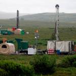 In this July 13, 2007, file photo, workers with the Pebble Mine project test drill in the Bristol Bay region of Alaska, near the village of Iliamma. (AP Photo / Al Grillo)