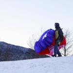 Robert Fawcett familiarizes himself with a new wing alongside the Gastineau Channel at Wayside Park on Jan. 27, 2021. (Michael S. Lockett / Juneau Empire)