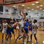 Juneau-Douglas High School Yadaa.at Kalé player Cooper Kriegmont shoots during a game against Thunder Mountain High School on Jan. 30, 2021. (Courtesy photo / Lexie Razor)