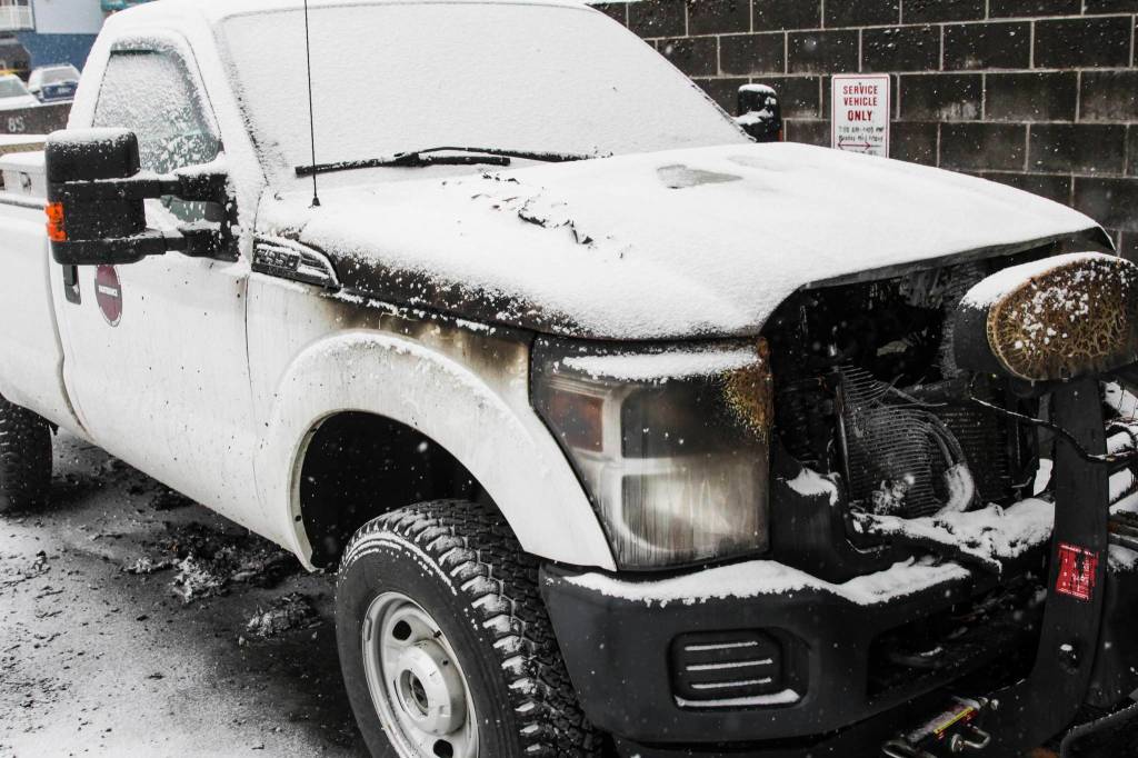 Michael S. Lockett / Juneau Empire 
A Juneau School District plow truck caught fire Monday morning in the parking lot of Juneau-Douglas High School Yadaa.at Kalé, Feb. 1, 2021. No injuries were reported and the cause of the fire is unknown, said Capital City Fire/Rescue fire marshal Dan Jager.