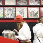 Kaitlyn (left) and Tracy Forst (right) look through records at Hi-Fi Senpai on Saturday, Jan. 30. The two left with vinyl copies of albums by ABBA and Styx. (Ben Hohenstatt / Juneau Empire)