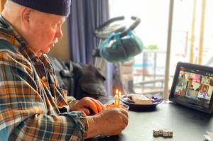 Grandpa Mickey Prescott celebrates his 80th birthday via Zoom in 2020.  (Vivian Prescott / For the Capital City Weekly)