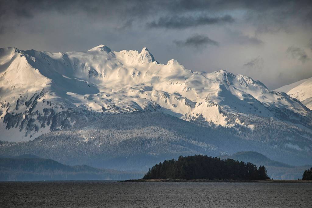 The Chilkat Mountains tower above William Henry Bay in this Friday, Feb. 26 photo. (Courtesy Photo / Kenneth Gill, gillfoto)