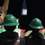Coast Guard Cutter Hickory crewmembers offload pallets of water meant for the residents in Angoon, Alaska, Feb. 14, 2021. Four pallets of water were recently shipped to Angoon. The communitys water supply was threatened because of cold and mechanical failures. (U.S. Coast Guard photo)