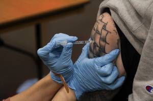T.J. Manner Cramer received a COVID-19 vaccine at Centennial Hall on Thursday, Feb. 11, 2021. (Michael S. Lockett / Juneau Empire)