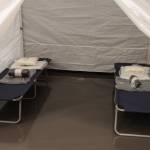 Centennial Hall was appropriated by the City and Borough of Juneau as an evacuation shelter for those in the path of possible avalanches, including appropriately distanced pod sleeping arrangements like those shown here, on Feb. 27, 2021. (Michael S. Lockett / Juneau Empire)