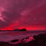 The incoming tide is enveloped in colors from the sunset over Outer Point on Sunday, March 7 2021. (Courtesy Photo / Eric Bleicher, @ebleiche on IG)
