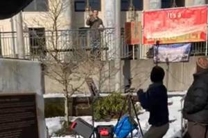 A man, seen at top center, threw snowballs at and verbally harassed a group of Alaska Native women at a rally near the Alaska State Capitol on Friday, Feb. 26, 2021. (Courtesy photo / Jamiann Hasselquist)