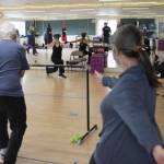 Janet Valentour, center, leads a boxing class designed to help fight back against the symptoms Parkinsons disease through a specific regimen at Pavitt Health and Fitness on March. 2, 2021. (Michael S. Lockett / Juneau Empire)