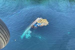 The 52-foot fishing vessel, Haida Lady, submerged between Cobb Island and Silver Point South of Sitka, Alaska, February 28, 2021. (Courtesy photo / U.S. Coast Guard)
