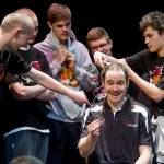 Michael Penn / Juneau Empire File
Juneau-Douglas High School head basketball coach Robert Casperson gets his hair cut on stage by senior Treyson Ramos during a school assembly`, holding up his end of the bargain that he would shave his head if his team won the state championship title. Casperson said he trusted the 2016 teams senior class a lot.