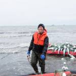 Erin Ranney with sockeye salmon at her setnet site in the Egegik District. (Courtesy Photo / Erin Ranney)