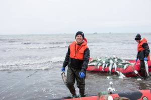 Erin Ranney with sockeye salmon at her setnet site in the Egegik District. (Courtesy Photo / Erin Ranney)