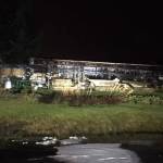 This photo shows a multi-vehicle carport following an early morning fire. (Courtesy Photo / Capital City Fire/Rescue)