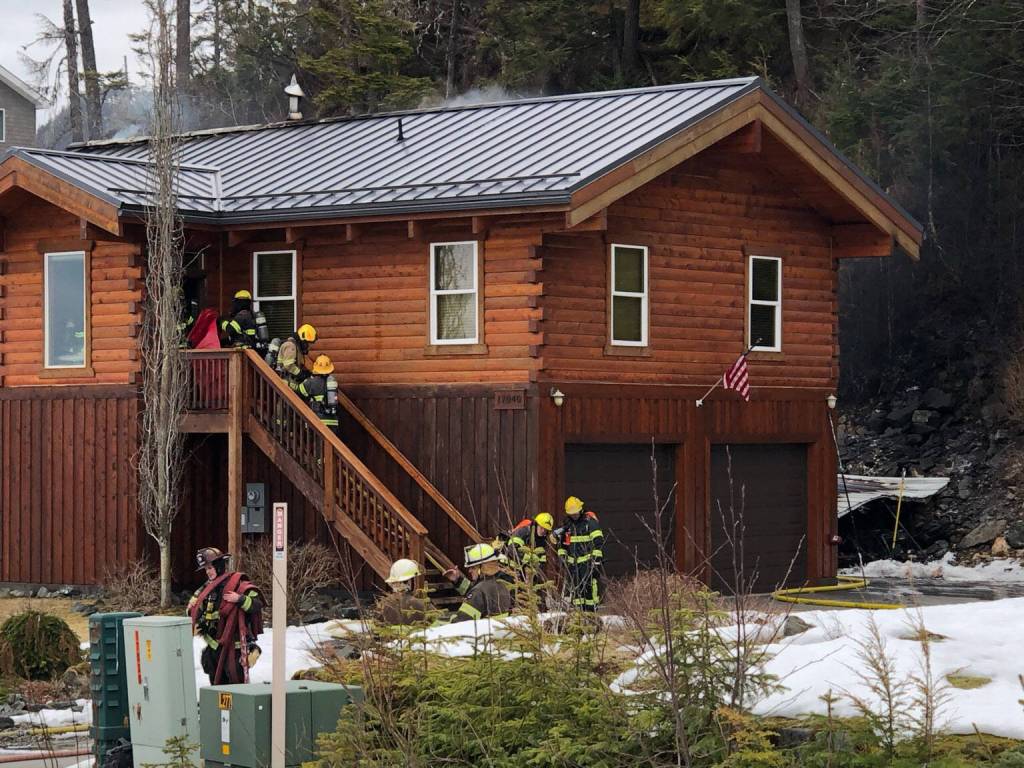 Capital City Fire/Rescue responded to a fire near Lena Beach on Wednesday, March 10, 2021, where a shed fire ignited the interior insulation of a residence. (Courtesy photo / Robert Zager)