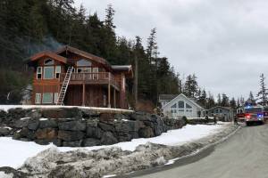 Capital City Fire/Rescue responded to a fire near Lena Beach on Wednesday, March 10, 2021, where a shed fire ignited the interior insulation of a residence. (Courtesy photo / Robert Zager)