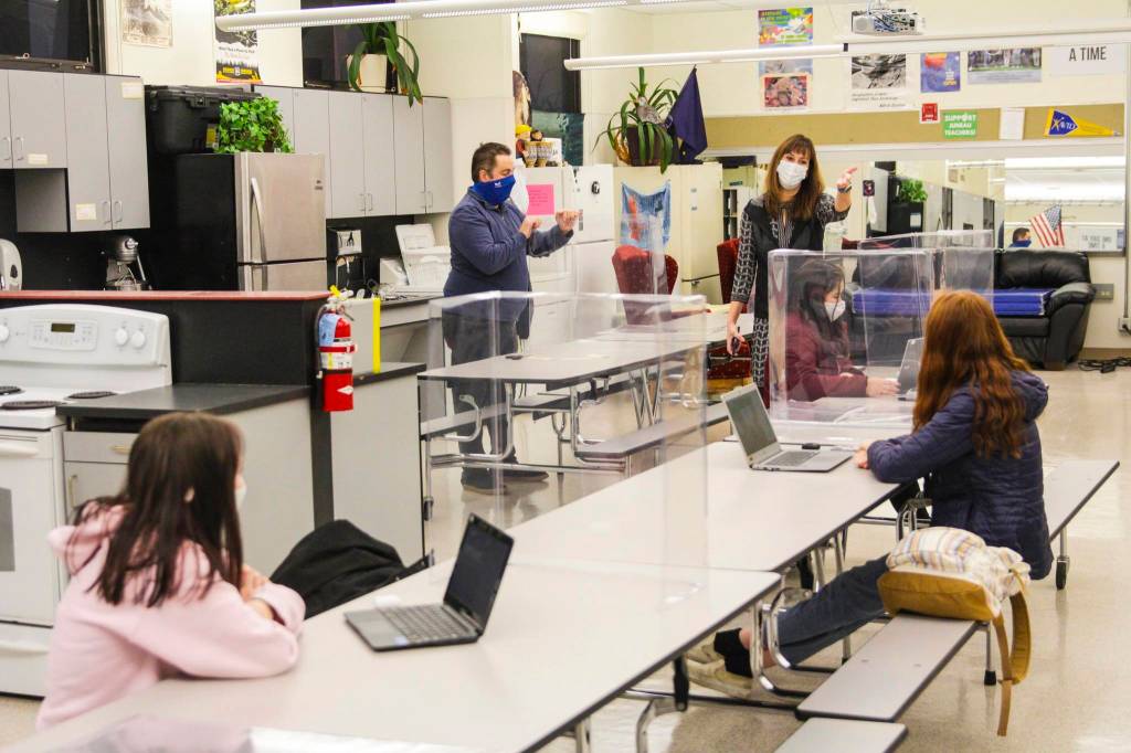Juneau School District Superintendent Dr. Bridget Weiss, center-right, talks to students as they re-enter school Monday morning with distancing strategies and mitigation protocols in place at Floyd Dryden Middle School, Jan. 11, 2021. (Michael S. Lockett / Juneau Empire)