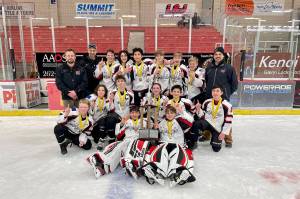 The Juneau Capitals swept six opposing 14U-Division A hockey teams en route to claiming a state title in Kenai over the March 19-21 weekend. (Courtesy Photo / Charity Platt)