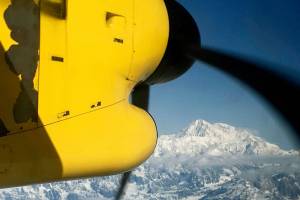 FILE - This May 10, 2017 file photo shows Denali, North America's tallest peak, from an airplane flying over the Alaska Range near Talkeetna, Alaska. Officials on Monday, April 5, 2021, said five people had to ski to a shelter after they landed on Ruth Glacier at the base of Denali on April 2, 2021, and a heavy snowstorm stranded them for at least three days. (AP Photo/Mark Thiessen, File)