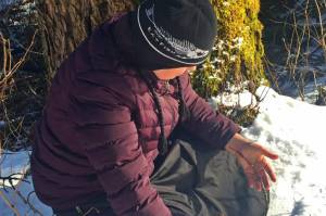 Vivian Mork Yéilk inspects cottonwood buds. (Courtesy Photo / Vivian Mork Yéilk)