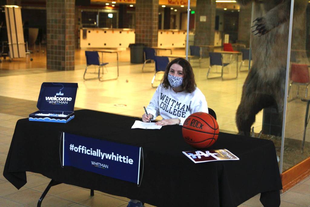 Juneau-Douglas High School: Yadaa.at Kalé senior Kiana Potter signs to playing basketball for Whitman College in Walla Walla, Wash., on April 8, 2021. (Michael S. Lockett / Juneau Empire)