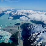 The Alsek River is the straight, tan waterway with a major branch that turns left into Alsek Lake. As the Grand Plateau Glacier — near top left of the photo — recedes, scientists think the Alsek River will flow that way to the sea. Currently, the Alsek River hangs a sharp right to reach Dry Bay and the Gulf of Alaska. (Courtesy Photo /Chris Larsen)