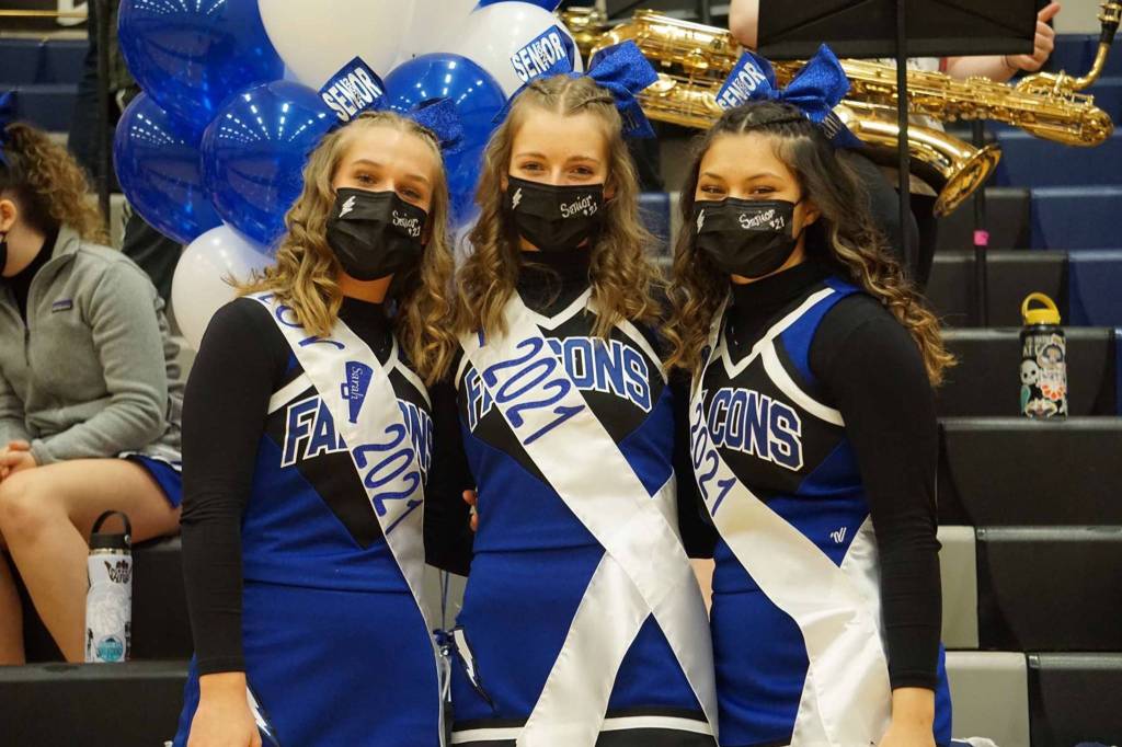 Courtesy photo / Susie Denton 
Sarah Heaton, Ann Steinman, and Kaylani Tupou, shown here, are graduating seniors from Thunder Mountain High Schools cheer team.