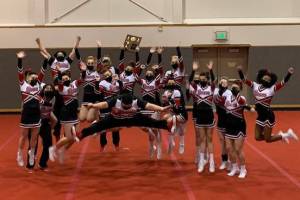 Juneau-Douglas High School: Yadaa.at Kalés cheer team, shown here after winning the Region V competition, went on to win the state championships for their division for 2021. (Courtesy photo / Carlene Nore)