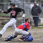 Thunder Mountains Oliver Mendoza catches a fly all against Sitka as then-teammate Bryson Echiverri ducks out of the way during the Region V Baseball Championship at Adair-Kennedy Memorial Park on Friday, May 24, 2019. TMHS lost 1-7. Mendoza is expected to be a key contributor for the Falcons this year. (Michael Penn | Juneau Empire File)