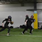 JDHS pitcher and utility player Kiah Yadao runs down Mackenzie Jackson, who plays first base, third base and right field. (Courtesy Photo / Lexie Razor)