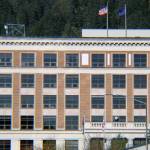 The U.S. Flag and Alaska state flag fly on the roof of the Alaska State Capitol on Saturday, Oct. 17, 2020. (Ben Hohenstatt / Juneau Empire)